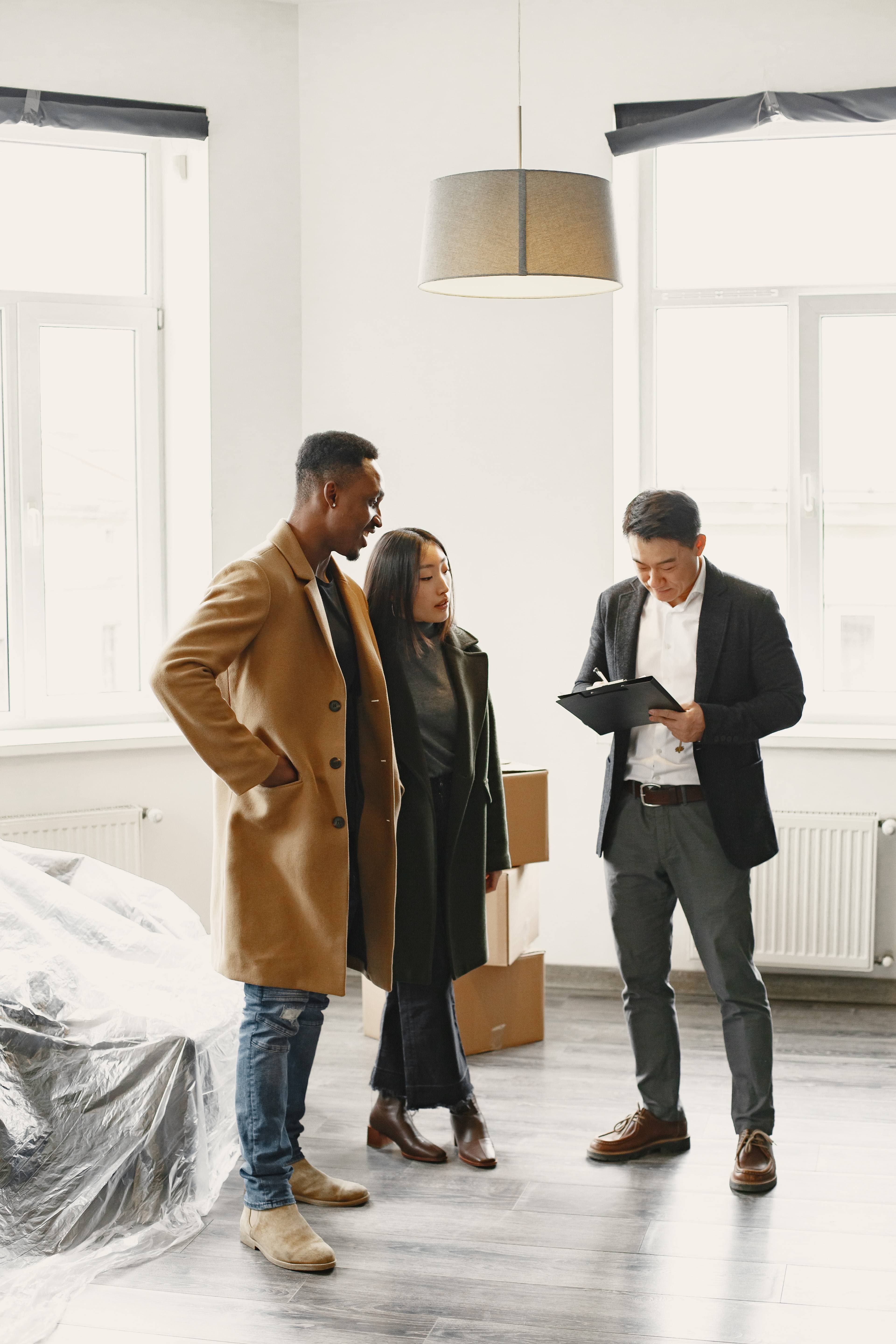 A property professional reviewing documents with prospective residents